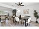 Open-concept living area with modern furnishings, fireplace, and stylish decor at 608 Pearl Rd, Winter Springs, FL 32708
