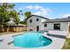 Inviting backyard pool with a spacious deck, perfect for outdoor relaxation and entertaining at 608 Pearl Rd, Winter Springs, FL 32708