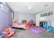 Charming bedroom with princess decor, perfect for a young  at 609 Big Pine Ave, Minneola, FL 34715