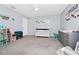 Comfortable bedroom with modern décor, crib, and dresser at 609 Big Pine Ave, Minneola, FL 34715