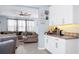 Charming coffee bar area features cabinetry, granite countertops, and decorative accents at 609 Big Pine Ave, Minneola, FL 34715