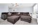 Spacious living room with comfortable seating and modern decor for relaxing or entertaining guests at 609 Big Pine Ave, Minneola, FL 34715