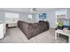 Comfortable living room provides a generous seating area and ample natural light, perfect for relaxing and entertaining at 609 Big Pine Ave, Minneola, FL 34715