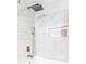 Bathroom features a shower with marble tile and sleek fixtures at 6384 Raleigh St # 2214, Orlando, FL 32835