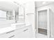Modern bathroom features a sleek vanity and walk-in closet at 6384 Raleigh St # 2214, Orlando, FL 32835