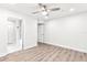 Bedroom with ensuite bathroom and light-colored flooring at 6384 Raleigh St # 2214, Orlando, FL 32835