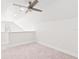 Bright bedroom with vaulted ceiling and neutral carpet at 6384 Raleigh St # 2214, Orlando, FL 32835