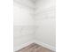 Bright closet with wire shelving and hardwood floors, ready for ample storage in any bedroom at 6384 Raleigh St # 2214, Orlando, FL 32835
