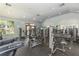 On-site gym facility with treadmills, weight machines, and ample workout space at 6384 Raleigh St # 2214, Orlando, FL 32835