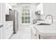 Bright kitchen with stainless steel appliances, modern cabinets, and ample countertop space, perfect for meal preparation at 6384 Raleigh St # 2214, Orlando, FL 32835