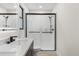 Modern bathroom featuring a shower with matte black hardware and tiled walls at 643 Princewood Dr, Deland, FL 32724