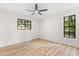This bedroom offers lots of natural light and is equipped with a ceiling fan at 643 Princewood Dr, Deland, FL 32724