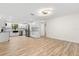 Modern kitchen featuring stainless steel appliances and sleek, white cabinetry at 643 Princewood Dr, Deland, FL 32724