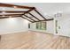 Bright living room with wood-beamed ceilings and an abundance of natural light at 643 Princewood Dr, Deland, FL 32724