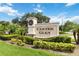 Landscaped entrance sign for Carter Glen, a welcoming community with manicured greenery at 6484 S Goldenrod Rd # 41A, Orlando, FL 32822
