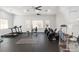 Well-equipped gym with treadmills, weights, and exercise machines, promoting a healthy lifestyle at 6484 S Goldenrod Rd # 41A, Orlando, FL 32822