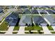 Aerial view of a residential neighborhood with well-maintained homes and landscaping at 7 Polermo Ave, St Cloud, FL 34771