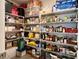 Spacious walk-in pantry features wire shelving, providing ample storage for food and household items at 7 Polermo Ave, St Cloud, FL 34771