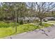 Charming single-story home with a well-manicured front lawn and mature trees offering shade at 708 Valencia Ct, Winter Garden, FL 34787