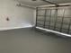 Spacious two-car garage with ample room for parking and storage at 739 Parrot Ct, Poinciana, FL 34759