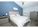 Comfortable bedroom featuring a plush bed, ample closet space, and a serene atmosphere at 759 Lake Como Dr, Lake Mary, FL 32746