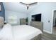 Bright bedroom with light grey furniture and a ceiling fan at 759 Lake Como Dr, Lake Mary, FL 32746