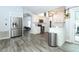 Open kitchen features stainless steel appliances, ample cabinetry, and easy access to dining area at 759 Lake Como Dr, Lake Mary, FL 32746