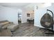 Cozy living room adjacent to the dining room, with modern gray flooring and open layout at 759 Lake Como Dr, Lake Mary, FL 32746