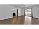 Bright bedroom with hardwood floors, ceiling fan and en-suite bathroom, adding convenience and privacy at 845 Valnera Ct, Kissimmee, FL 34758