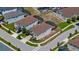 Aerial view of a lovely home and neighborhood street, showcasing its prime location and curb appeal at 8951 Hilton Ridge Ave, Kissimmee, FL 34747