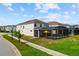 Charming home featuring a private screened-in pool, perfect for relaxing and entertaining outdoors at 8951 Hilton Ridge Ave, Kissimmee, FL 34747