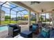 Inviting outdoor patio area with a pool, spa, and comfortable seating, perfect for relaxation at 8951 Hilton Ridge Ave, Kissimmee, FL 34747