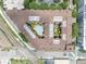 Aerial of condo building featuring a swimming pool and greenery in the complex's center at 911 N Orange Ave # 443, Orlando, FL 32801