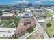Aerial view of a multi-story condo complex with city skyline and highway views at 911 N Orange Ave # 443, Orlando, FL 32801