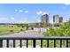 Balcony view of the surrounding cityscape and lush greenery at 911 N Orange Ave # 443, Orlando, FL 32801