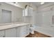 Bathroom featuring a bathtub, shower, and vanity with ample storage at 911 N Orange Ave # 443, Orlando, FL 32801