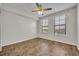 Bright bedroom with a ceiling fan and a window providing natural light at 911 N Orange Ave # 443, Orlando, FL 32801