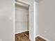 Walk-in closet with wire shelving and wood floors at 911 N Orange Ave # 443, Orlando, FL 32801