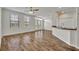 Bright living room featuring wood floors, large windows and breakfast bar for casual dining at 911 N Orange Ave # 443, Orlando, FL 32801