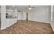Spacious living area featuring wood floors, breakfast bar and neutral walls at 911 N Orange Ave # 443, Orlando, FL 32801