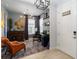 Inviting home office featuring stylish decor, modern lighting, and a comfortable leather chair at 971 Braewood Dr, Clermont, FL 34715