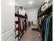 Large walk-in closet offers ample storage with shelving, rods, and room for organizing clothes and accessories at 971 Braewood Dr, Clermont, FL 34715
