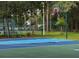 Basketball court at Andover Lakes Phase 1 Community Park, surrounded by lush landscaping at 10712 Fairhaven Way, Orlando, FL 32825