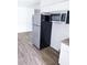 Modern kitchen featuring stainless steel appliances, ample storage, and sleek countertops, ready for cooking at 1200 Ne 45Th Pl, Ocala, FL 34479