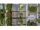 Aerial view of townhome community showing roof, yards and street access at 1615 Wilson Ave, Orlando, FL 32804