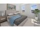 Comfortable bedroom with neutral tones, natural light, and stylish decor at 1878 Seawall Way, Celebration, FL 34747