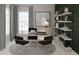Stylish home office featuring modern desk, chairs, custom bookshelf and abundant natural light from large window at 1896 Seawall Way, Celebration, FL 34747