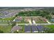A beautiful aerial view of a neighborhood of suburban homes with manicured green lawns at 1919 Sipes Ave, Sanford, FL 32771