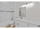 The bathroom features a tub and shower combo with white fixtures at 1919 Sipes Ave, Sanford, FL 32771