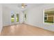 A bright bedroom with a door that leads outside at 1919 Sipes Ave, Sanford, FL 32771